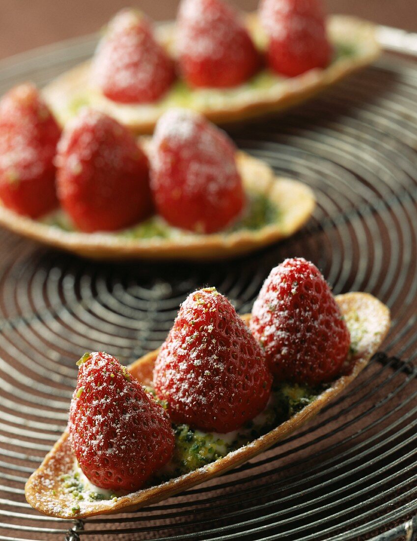 Strawberry and pistachio mini tarts