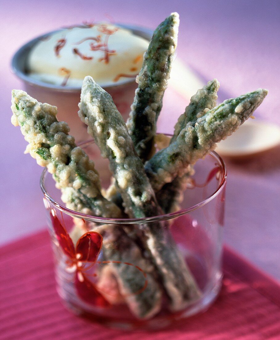 Asparagus tempura with saffron whipped cream