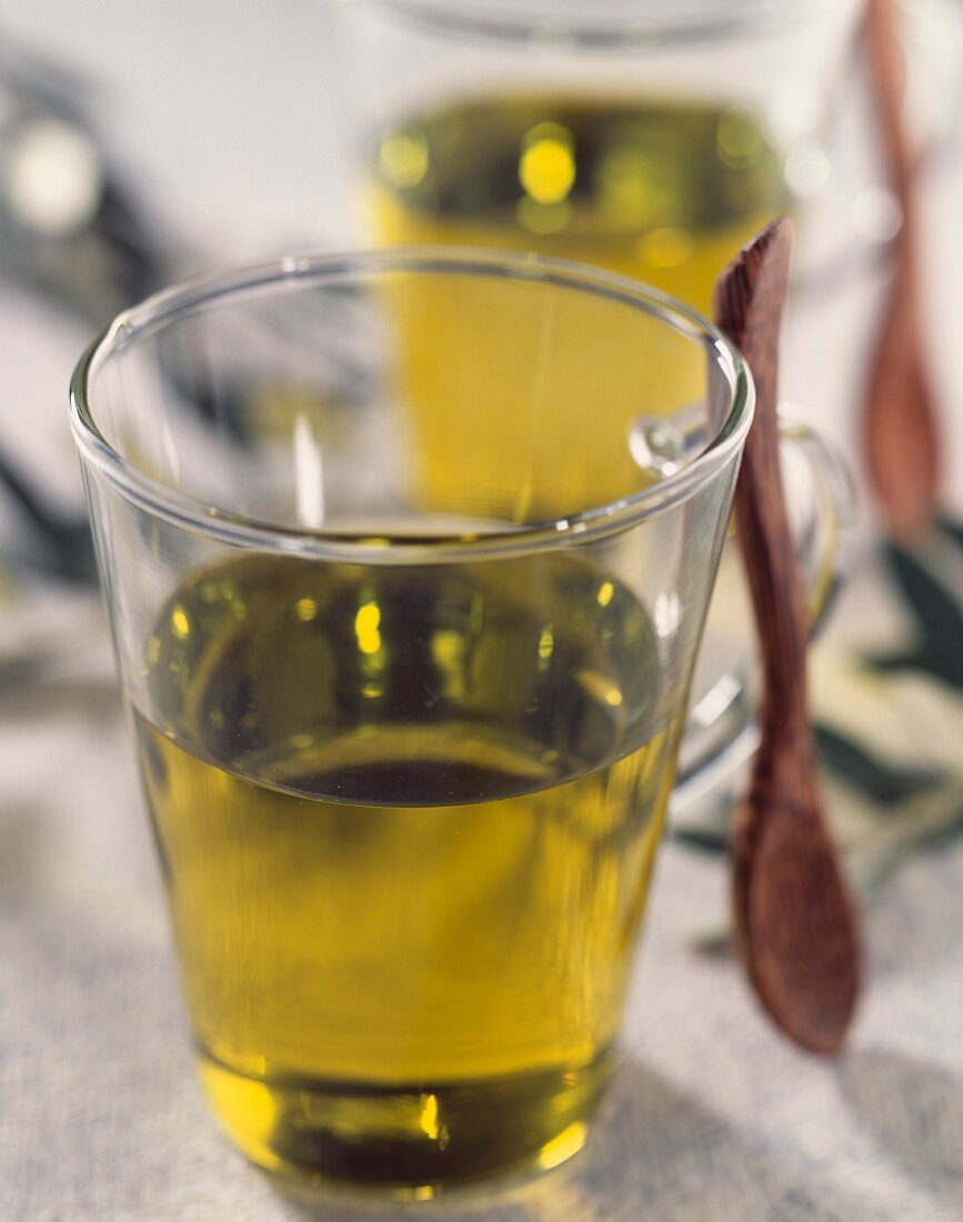 Glasses of olive oil