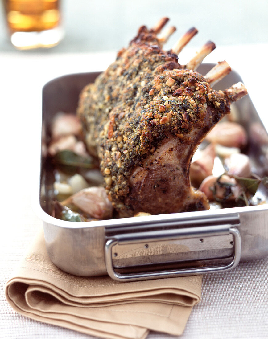 Rack of lamb with herbs and pine nuts