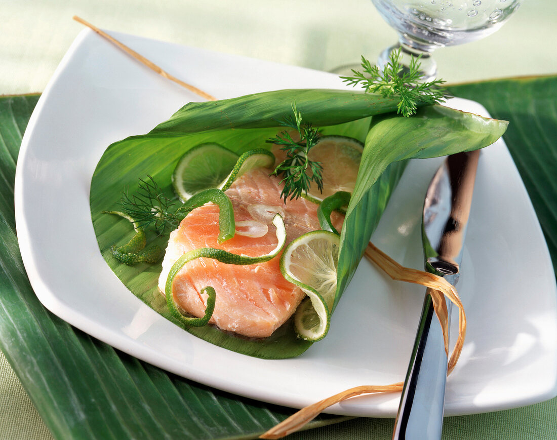 Salmon and lime wrapped in banana leaf