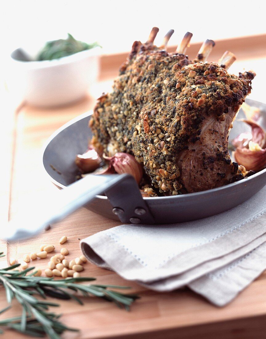 Lamb chops with herbs and pine nuts