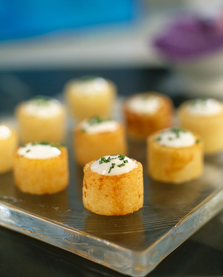 potato cylinders stuffed with cream and chives
