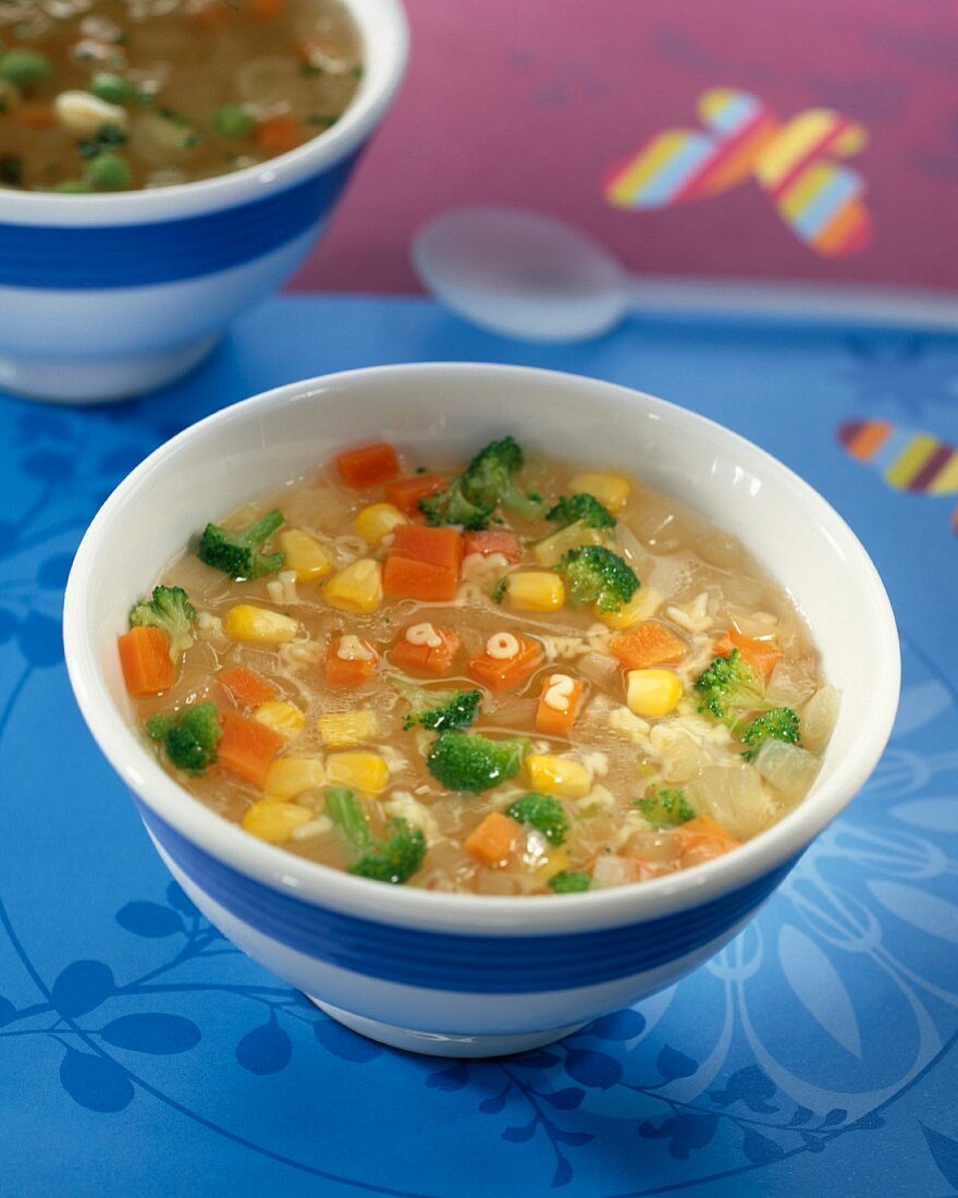 Vegetable soup with alphabet pasta
