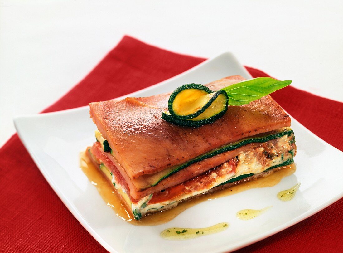 ham, zucchini and tomato lasagna with basil oil