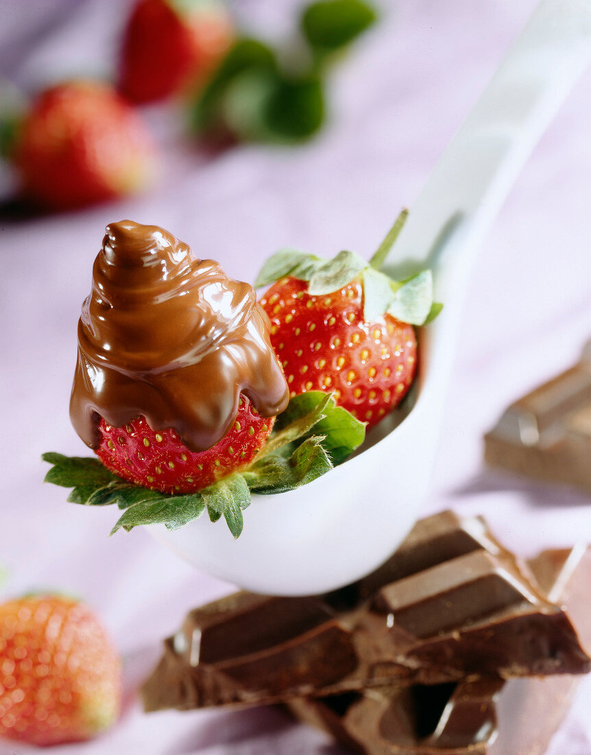 Melted chocolate on strawberry