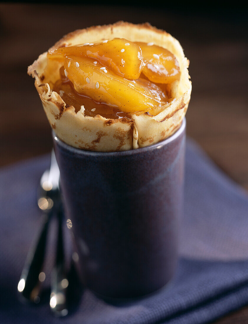 Pancake filled with stewed apricots