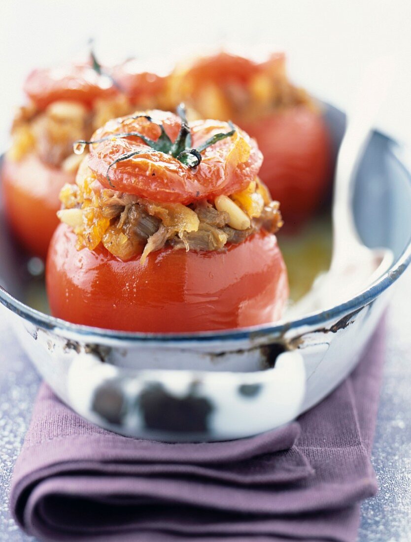 Tomatoes stuffed with lamb confit and dried fruit
