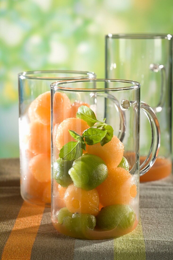 Melon and kiwi balls with basil