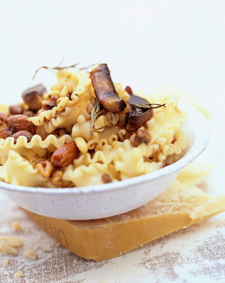 Pasta with mushrooms,dried fruit and parmesan