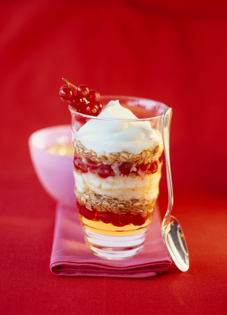 yoghurt with muesli, redcurrants and honey