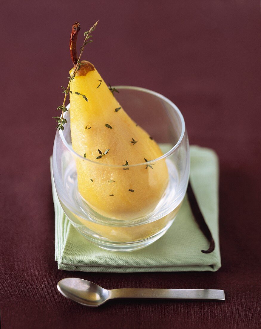 Poached pear with thyme