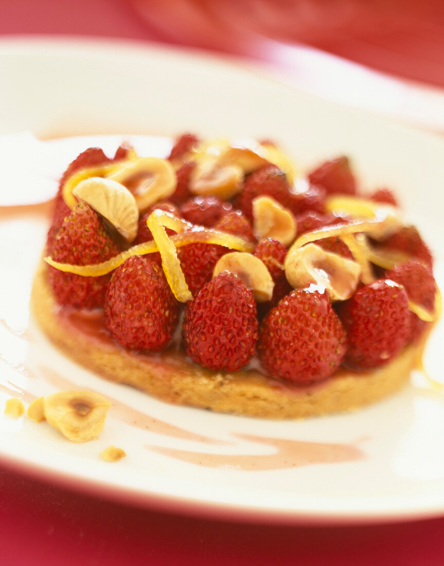 Strawberry, hazelnut and orange zest confit tart