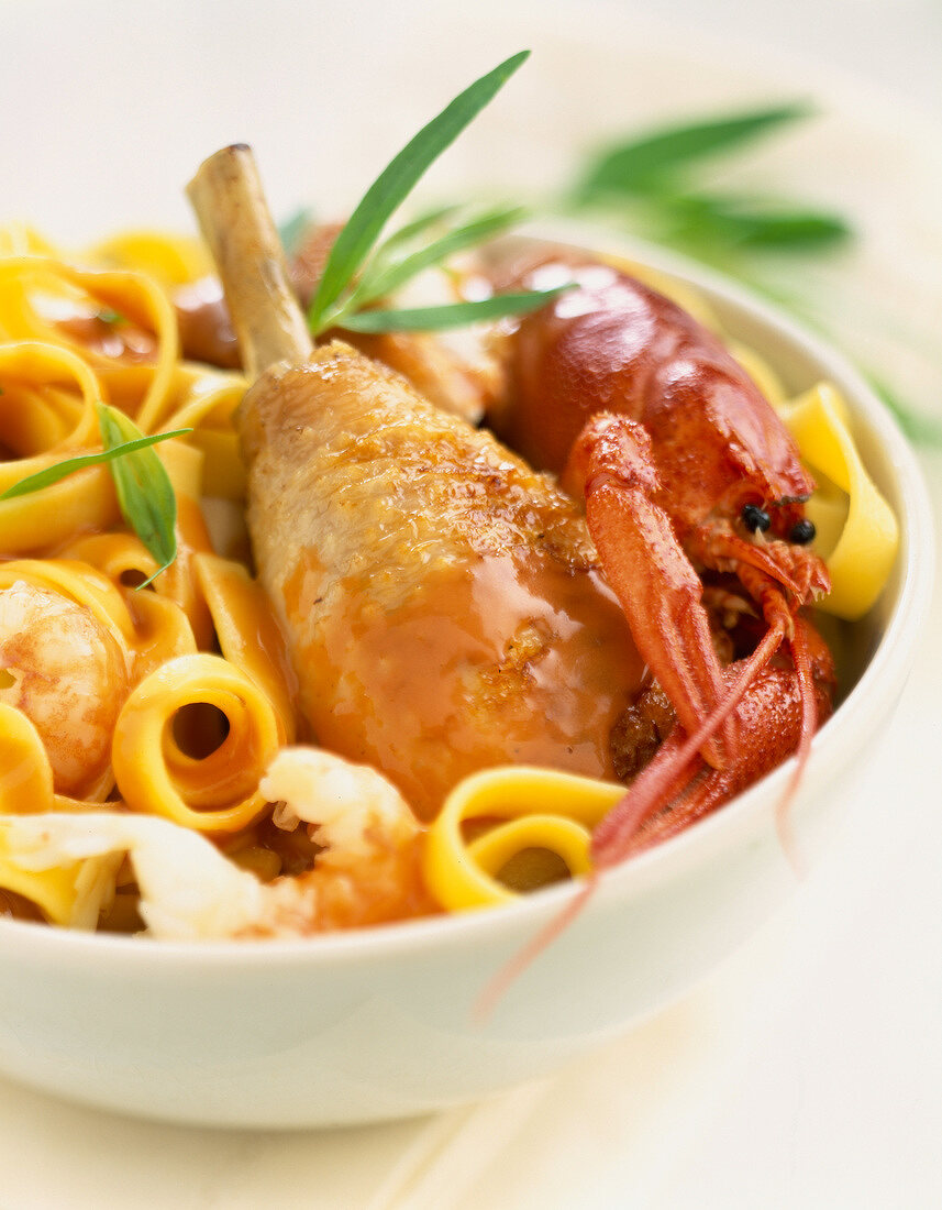 Poultry with crawfish and tagliatelle