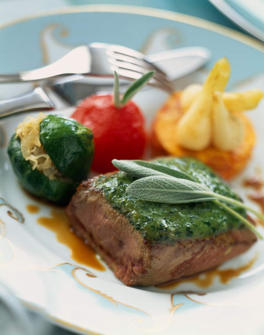 Thick slab of lamb with herbs and vegetables