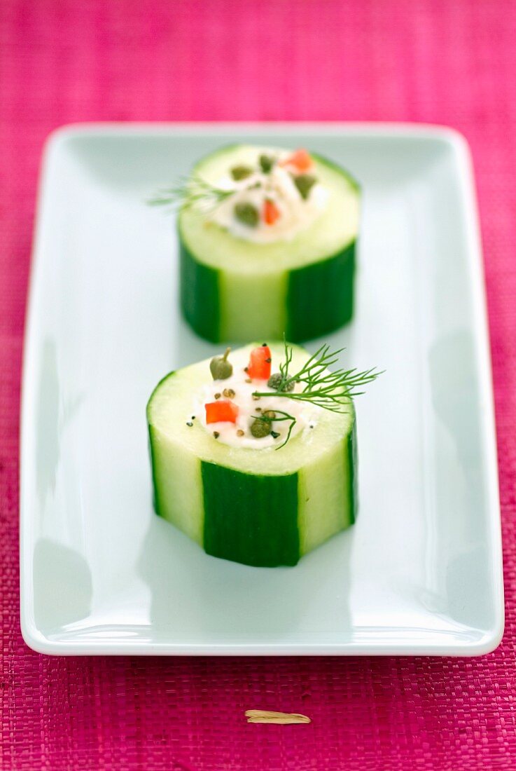 Pieces of cucumber stuffed with fromage frais