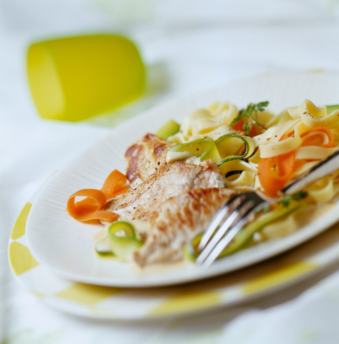Picatta escalope of veal with mixed tagliatelle and vegetables