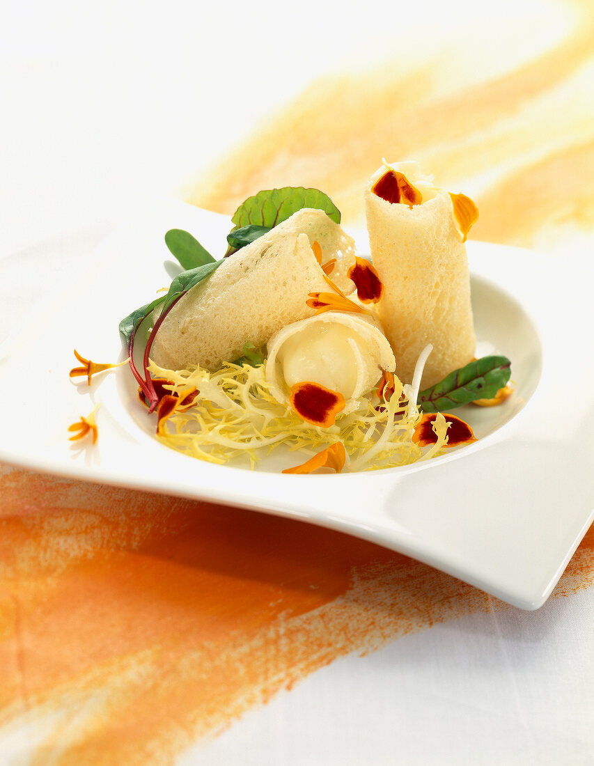 Creamed cheese rolls with marigold petals
