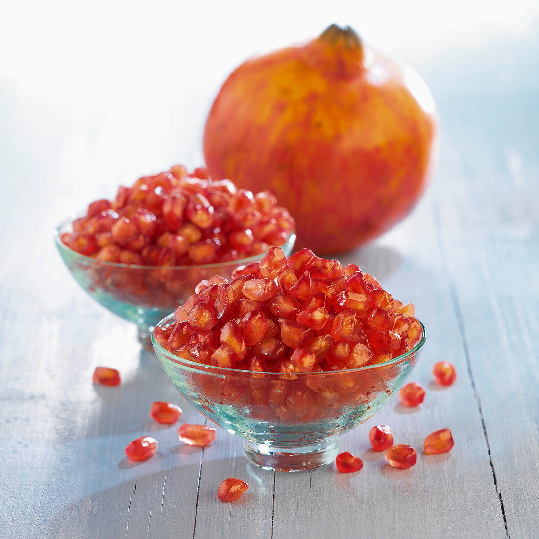 bowls of pomegranate seeds