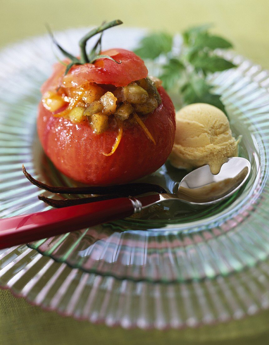 Tomato stuffed with vanilla-flavored vegetables and orange zests