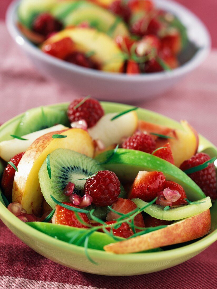 mixed fresh fruit with pomegranate