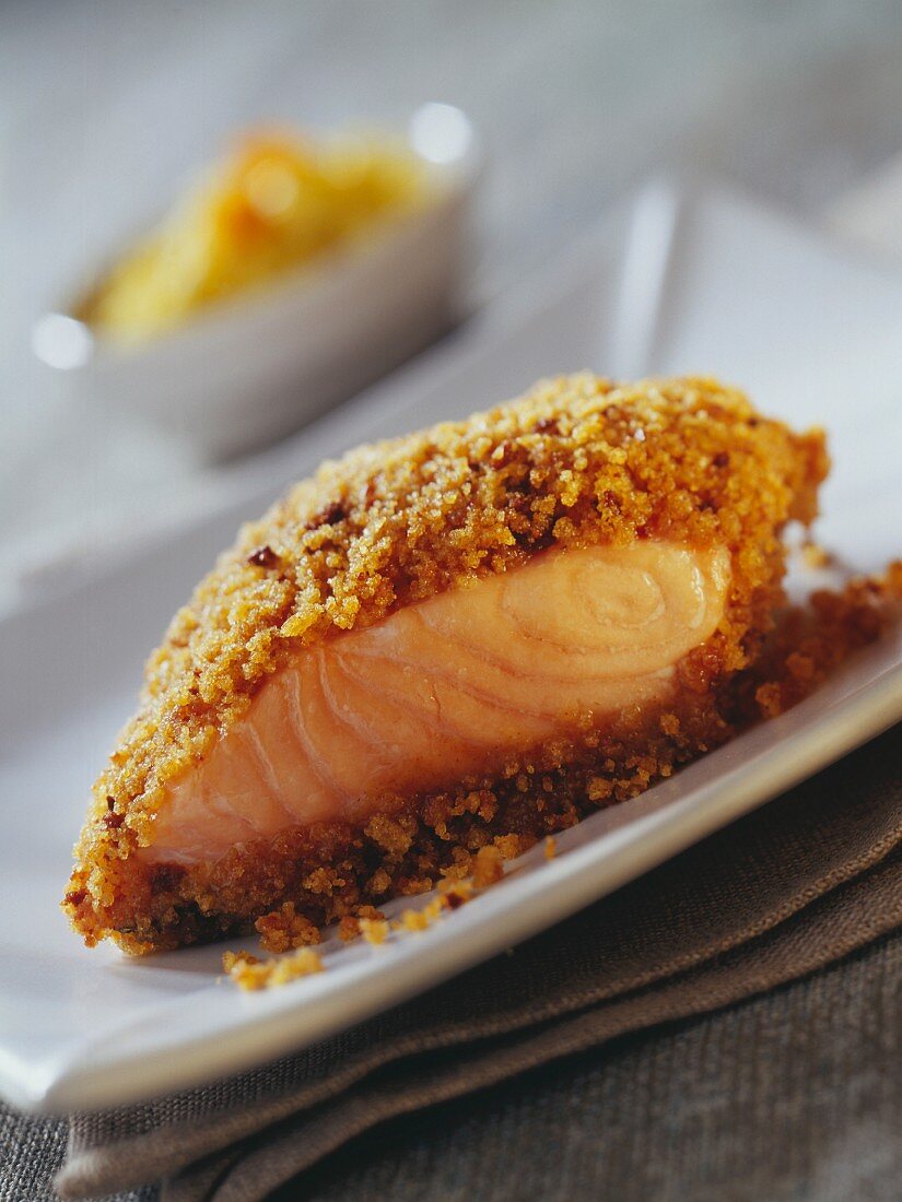Piece of salmon with gingerbread crust