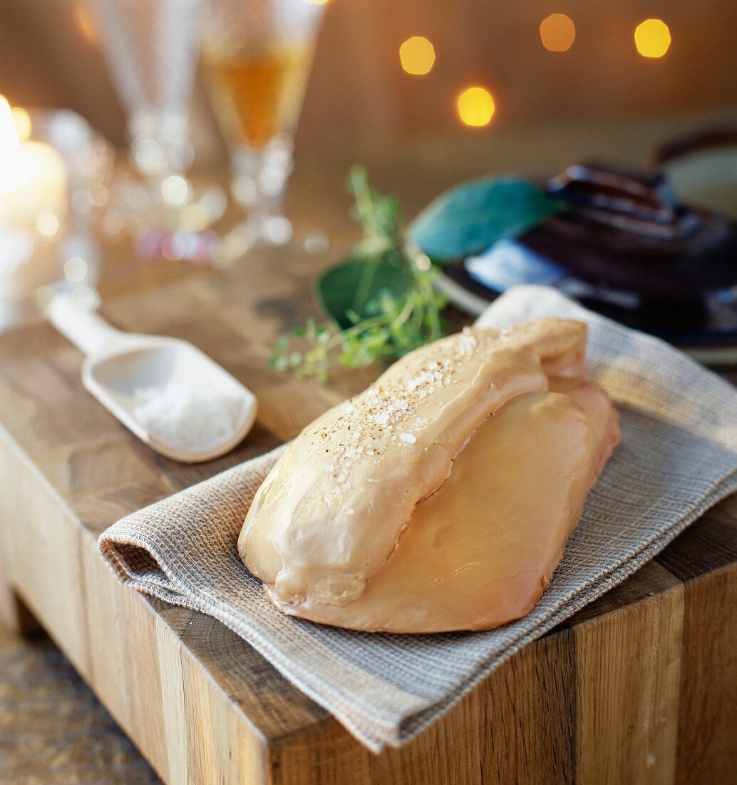 Towel-wrapped whole raw foie gras