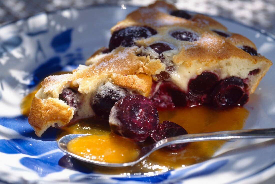 Cherry clafoutis with apricot coulis