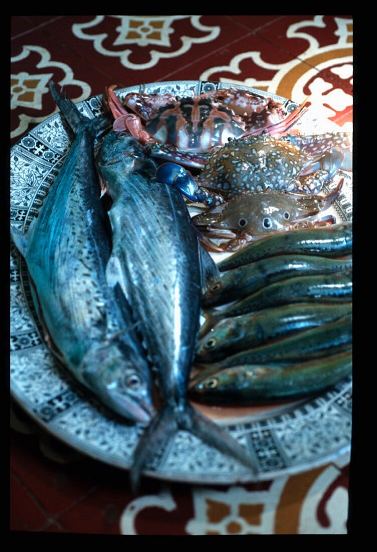 Various fish on a ceramic plate