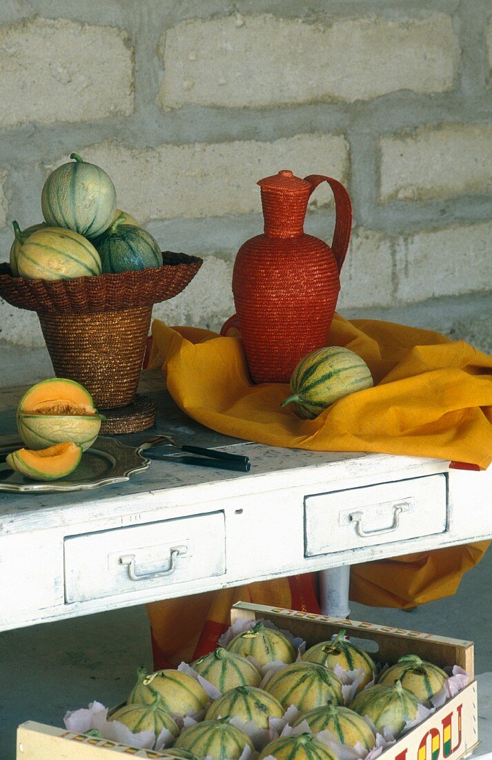 A Provençal arrangement of melons and wickerware