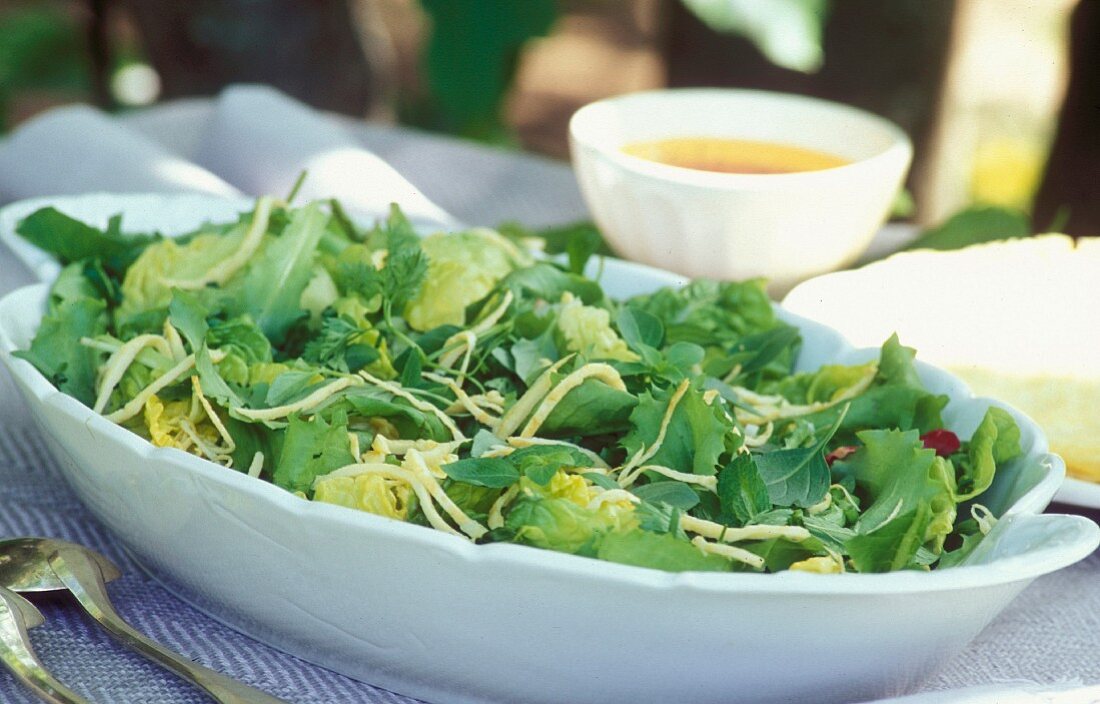 Green salad with omelette strips