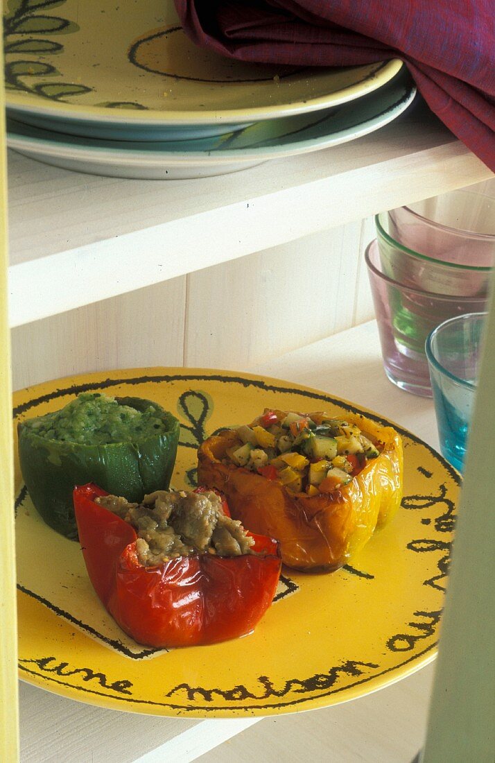 Stuffed Provençal-style peppers on a yellow plate