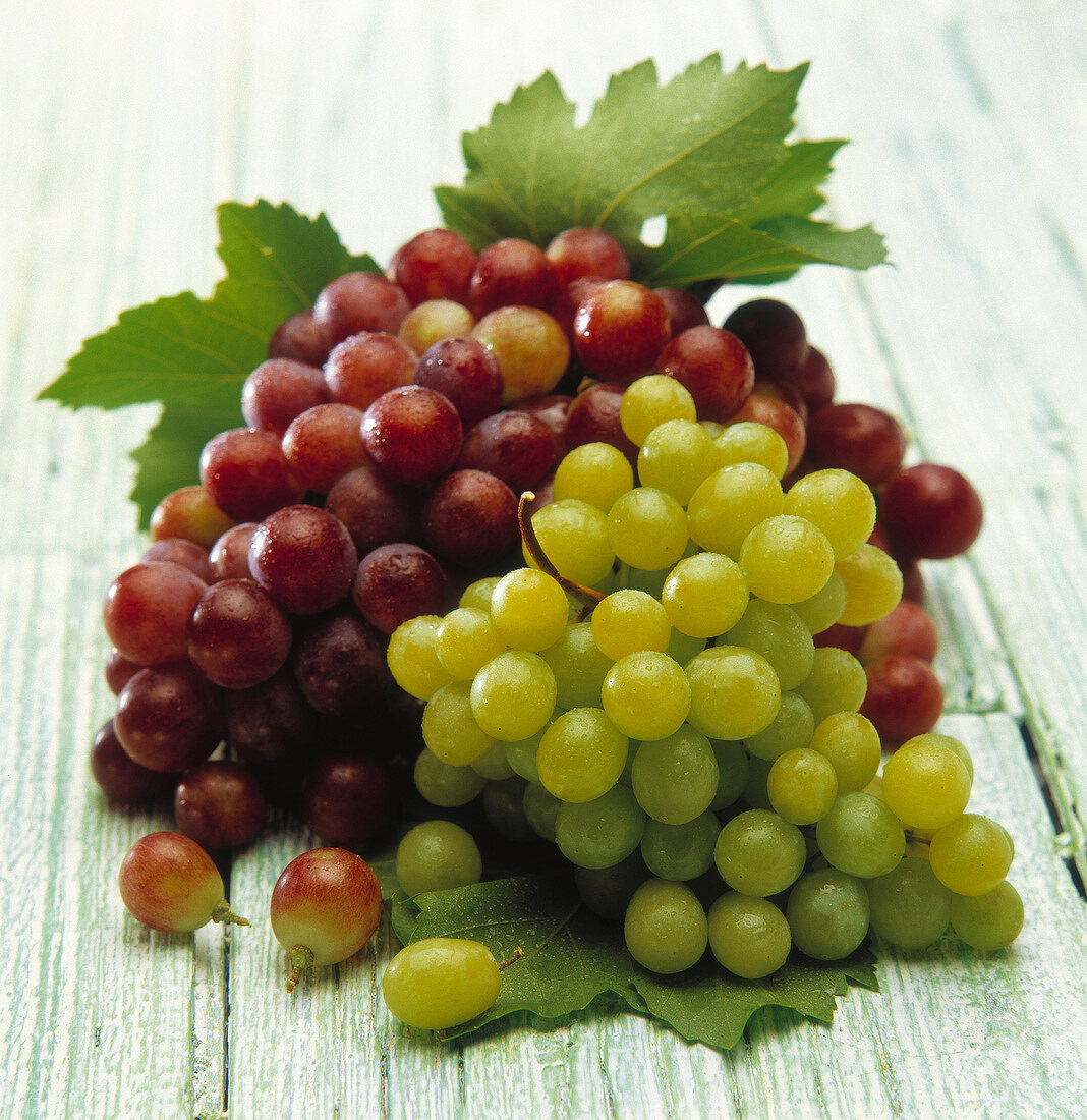 Bunches of red and green grapes