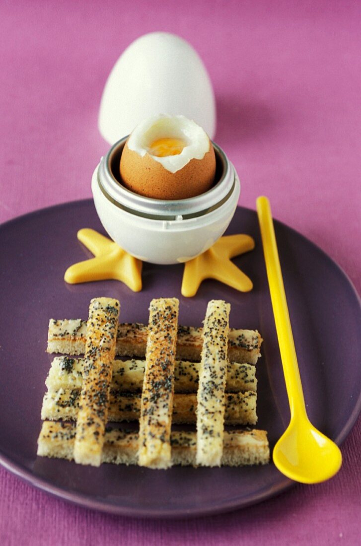 Soft boiled egg with poppy seed bread fingers