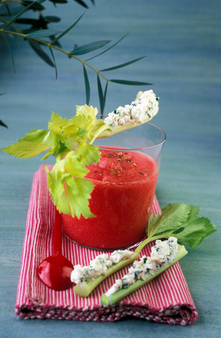 Tomato gaspacho and branches of celery coated with fromage frais