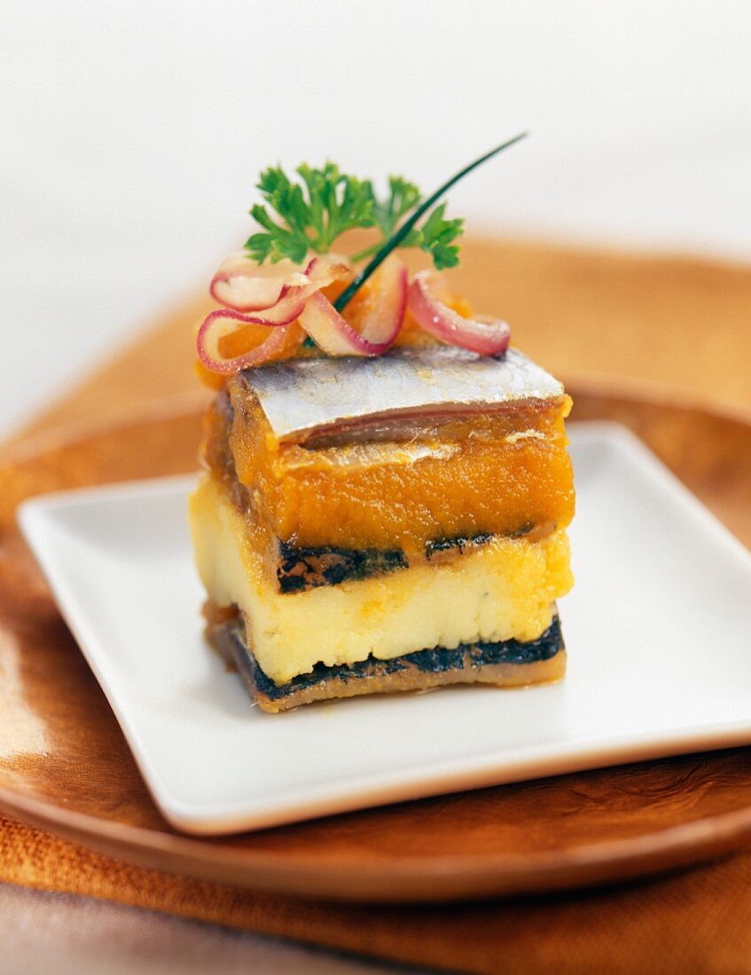 Herring savoury cake with stewed apricots