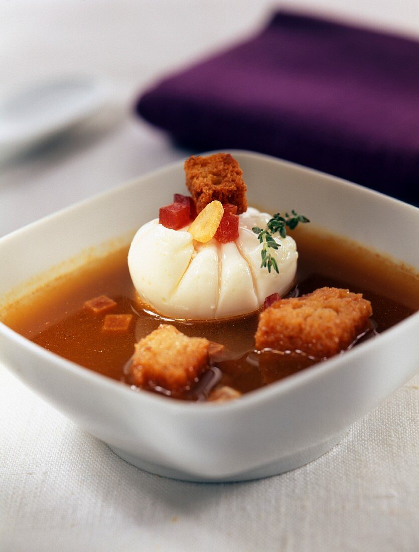 Garlic soup with croutons and hot pepper