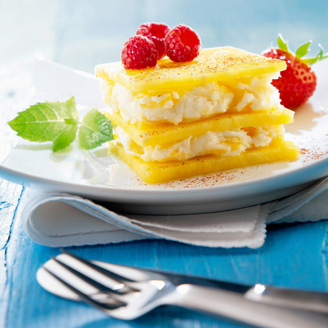 Pineapple mille-feuille with fresh cheese and raspberry