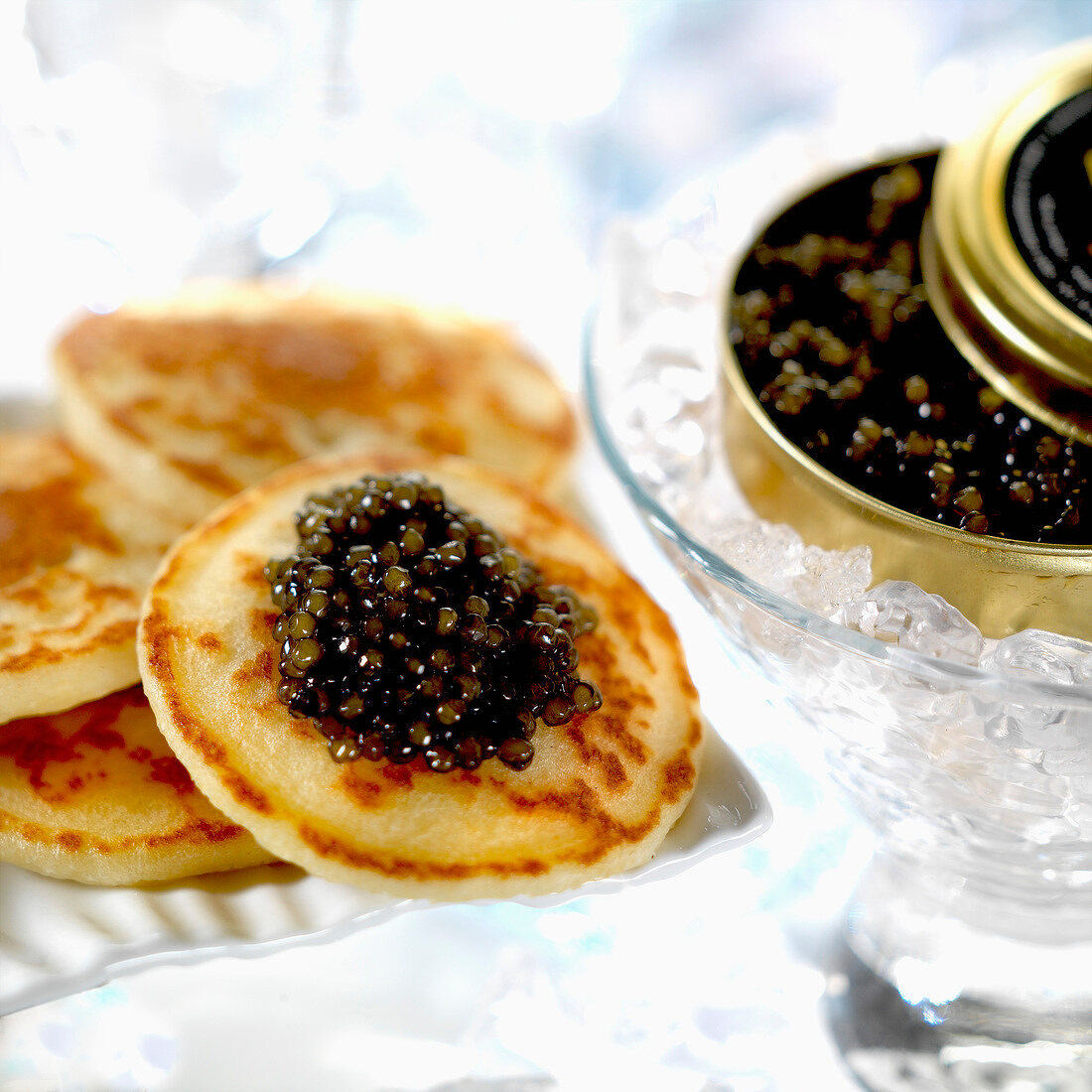 Mini blinis with caviar