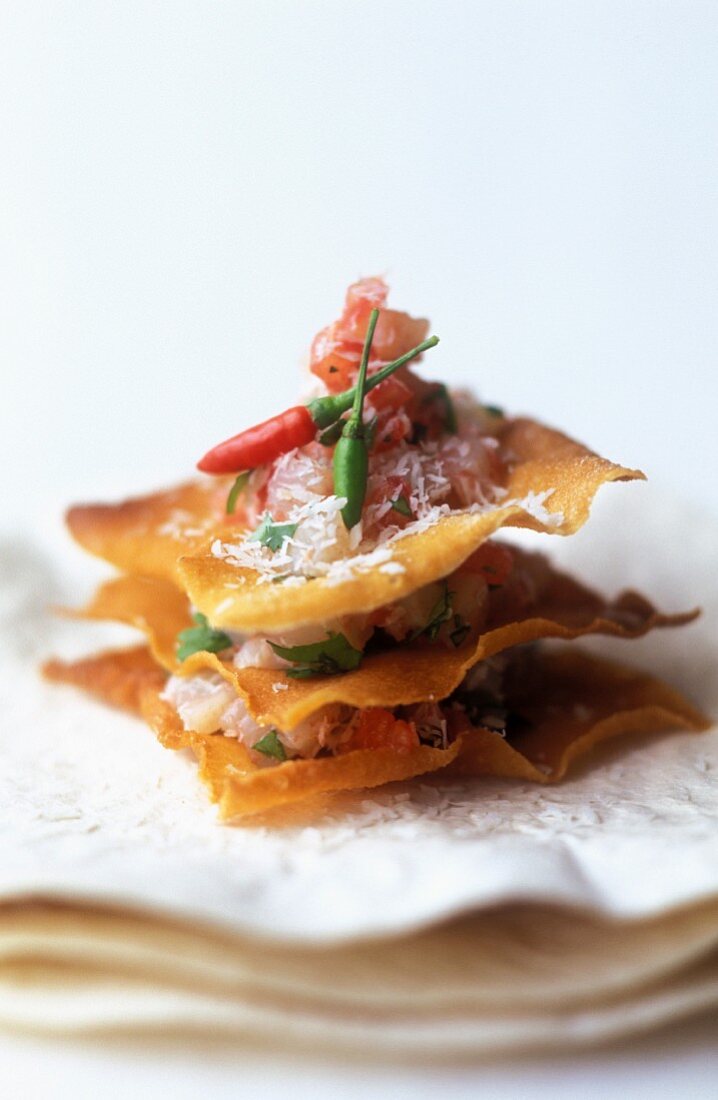 Sea bream tartare with layered flaky pastry and coconut