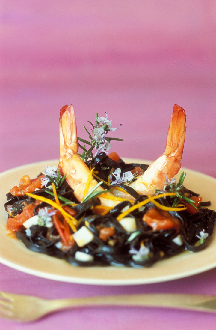 Tagliatelle with cuttlefish ink and prawns