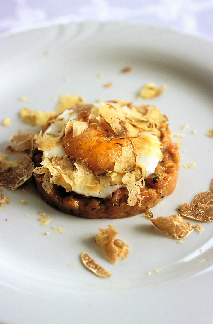 Beef tatar with egg and white truffles