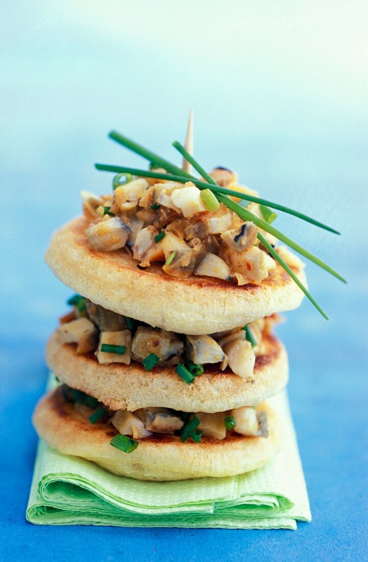 Blinis with snails and chives