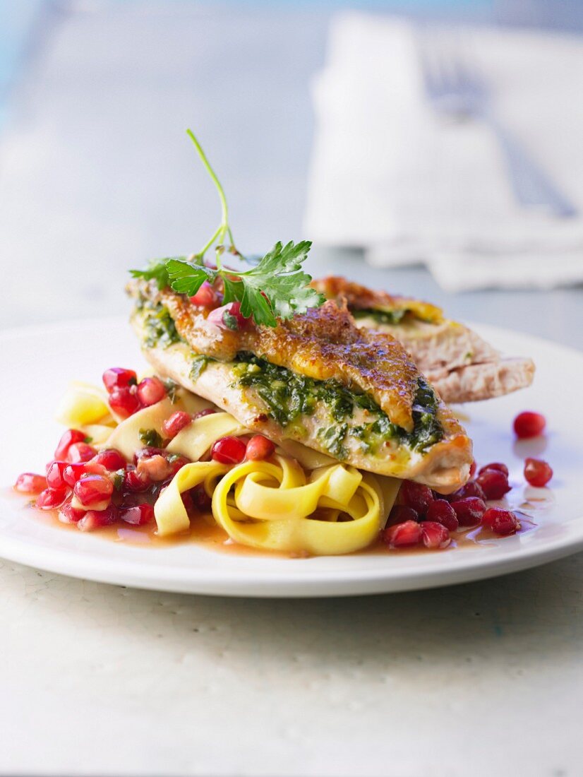 Roast guinea-fowl breast with herb butter and pomegranate