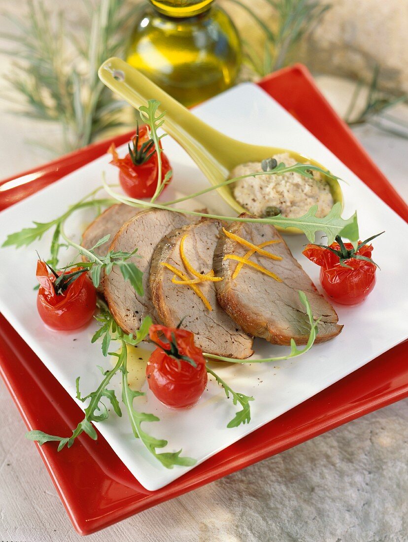 Cold roast pork with cherry tomatoes