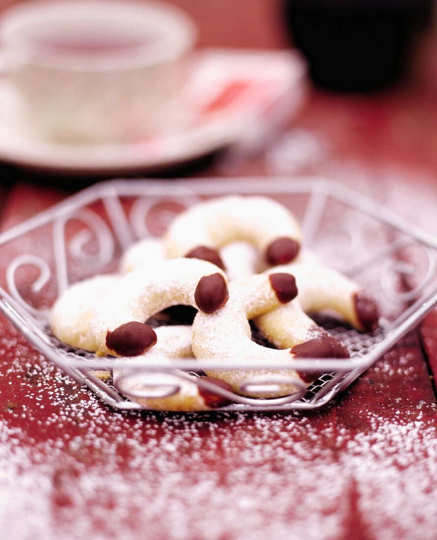 Cornes de gazelle (North African almond crescent biscuits) with vanilla sugar and chocolate glaze