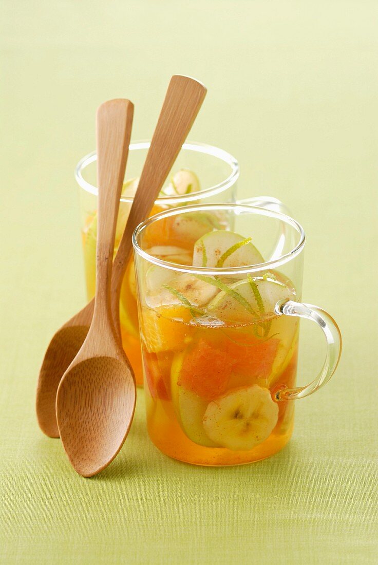 Apple soup with bananas, oranges and cinnamon