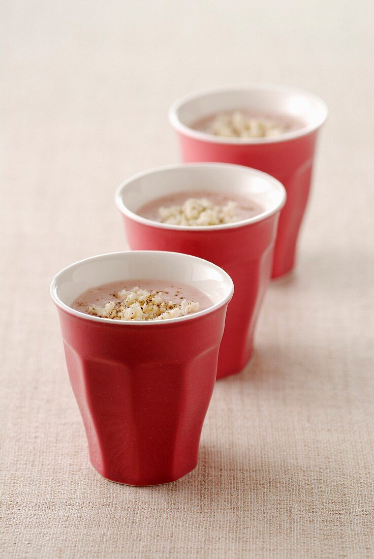 Cream of radish soup with tomato and feta cheese