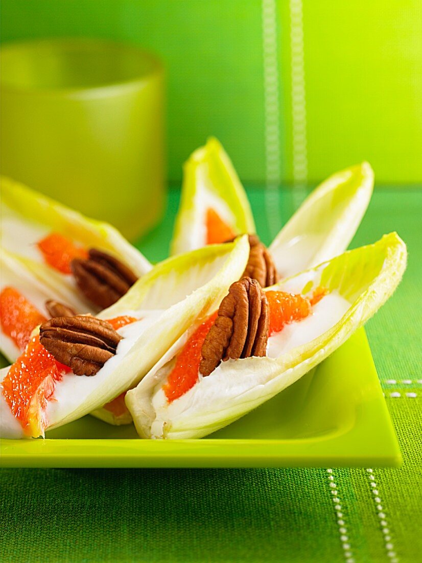 Chicory boats with pink grapefruit, yoghurt and pecan nuts