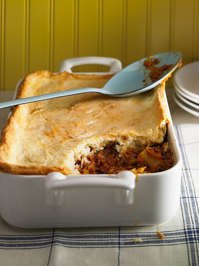Meat and vegetable bake topped with pastry